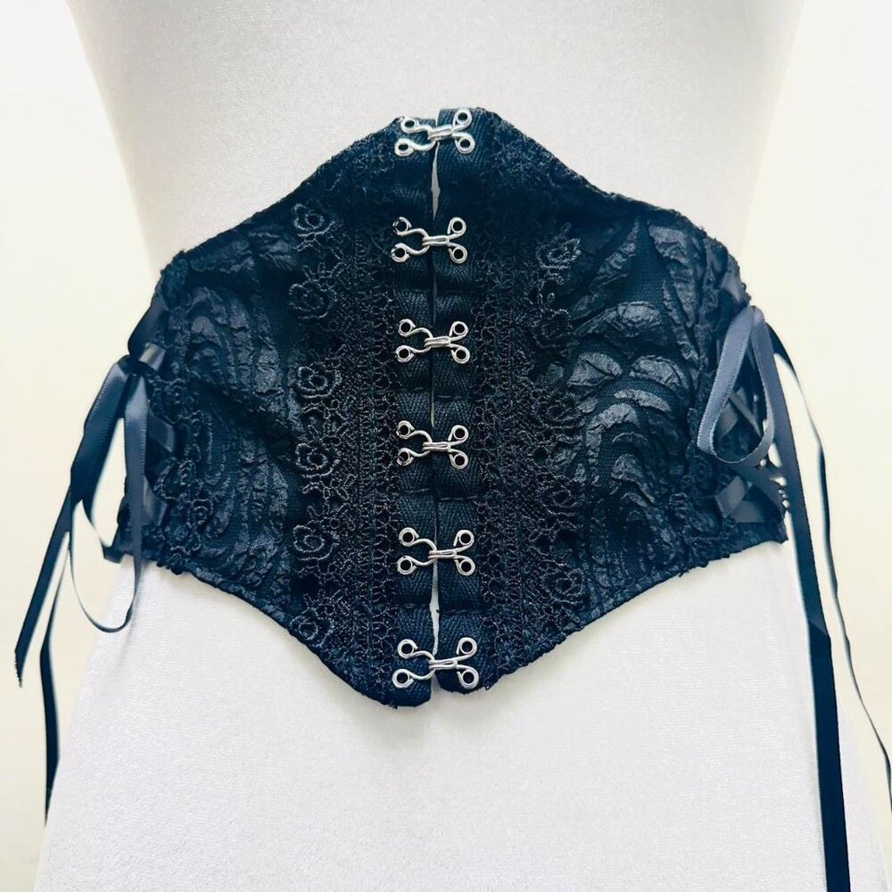 Black lace corset top with ribbon ties and boning